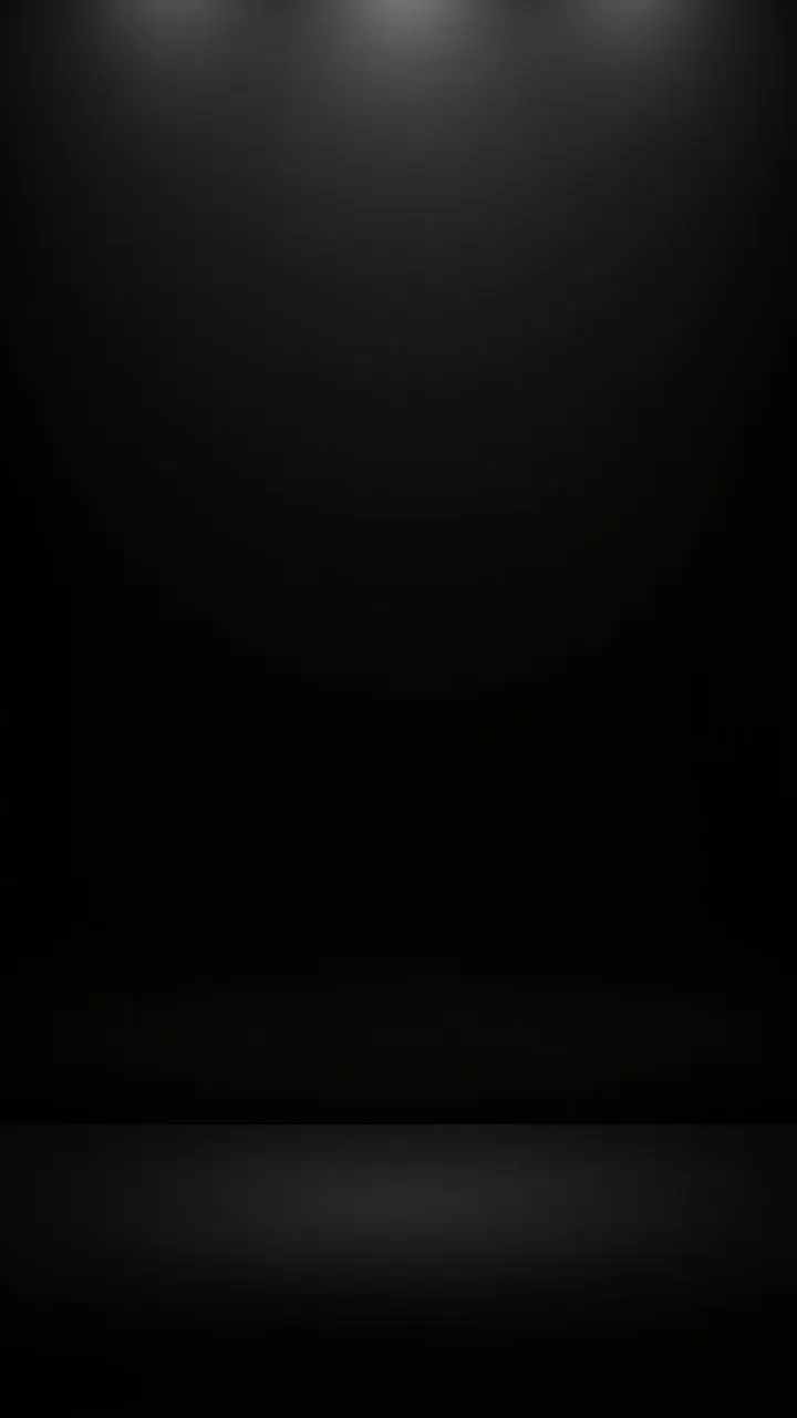Minimalist black background with depth and texture.