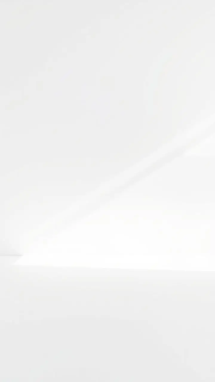 Minimalist composition with a focal point on a white background.