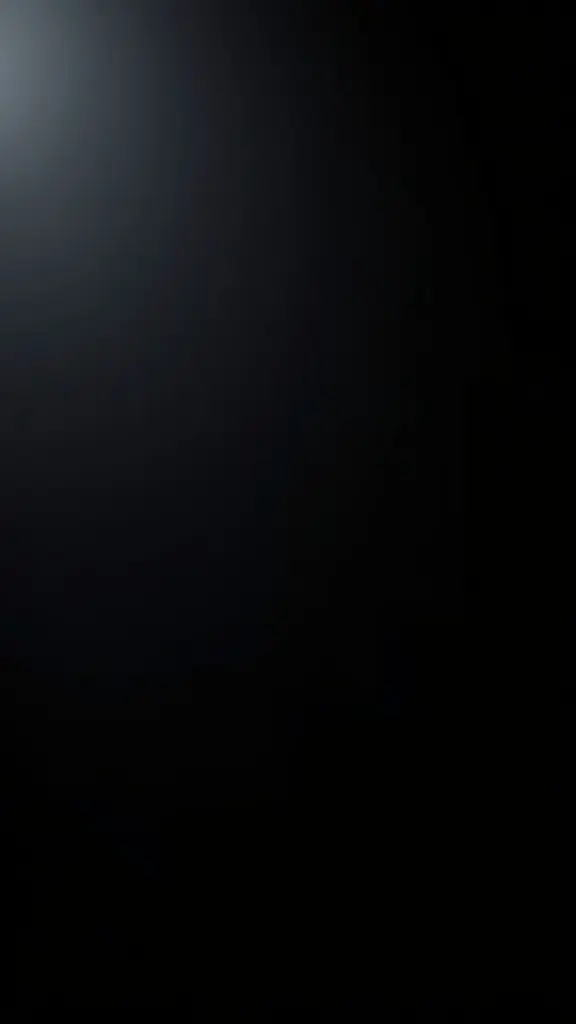 Minimalist design in deep true black with matte finish and subtle lighting.