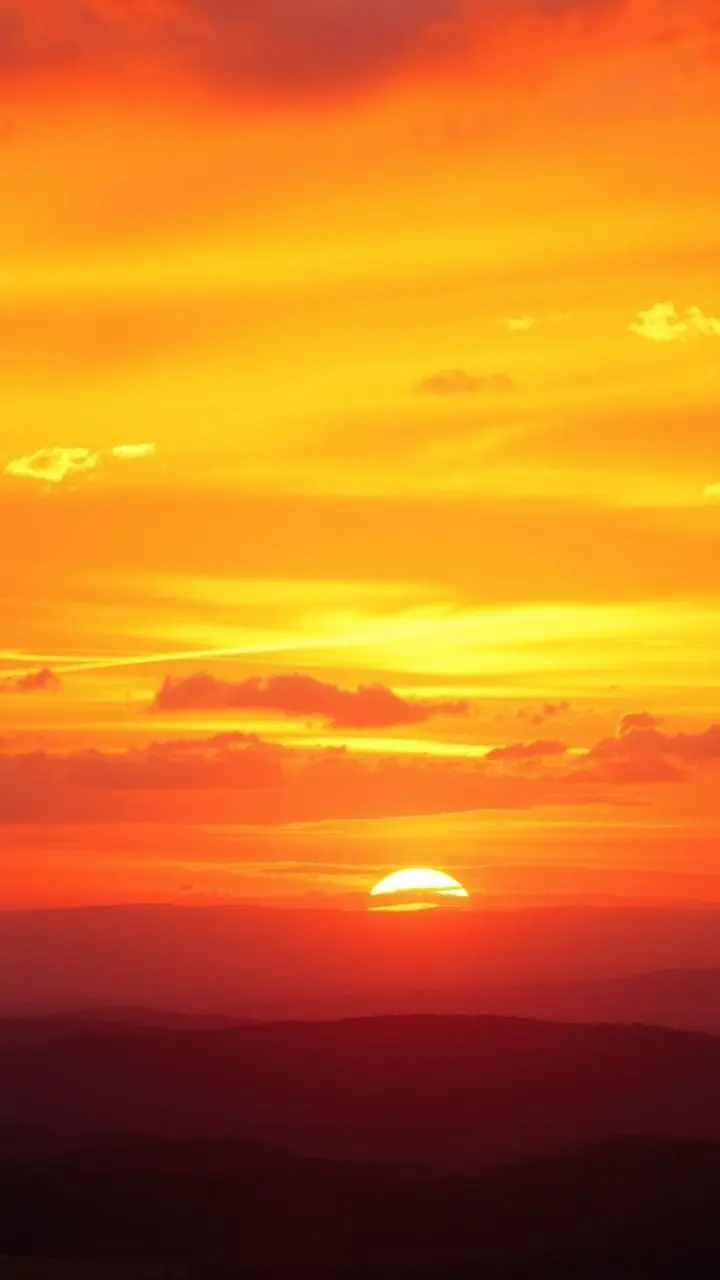 Detailed digital art of a vibrant sunset with warm colors.